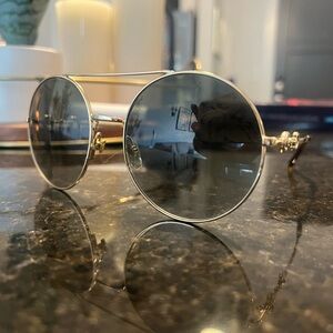 Gucci Gold and Black Round Sunglasses